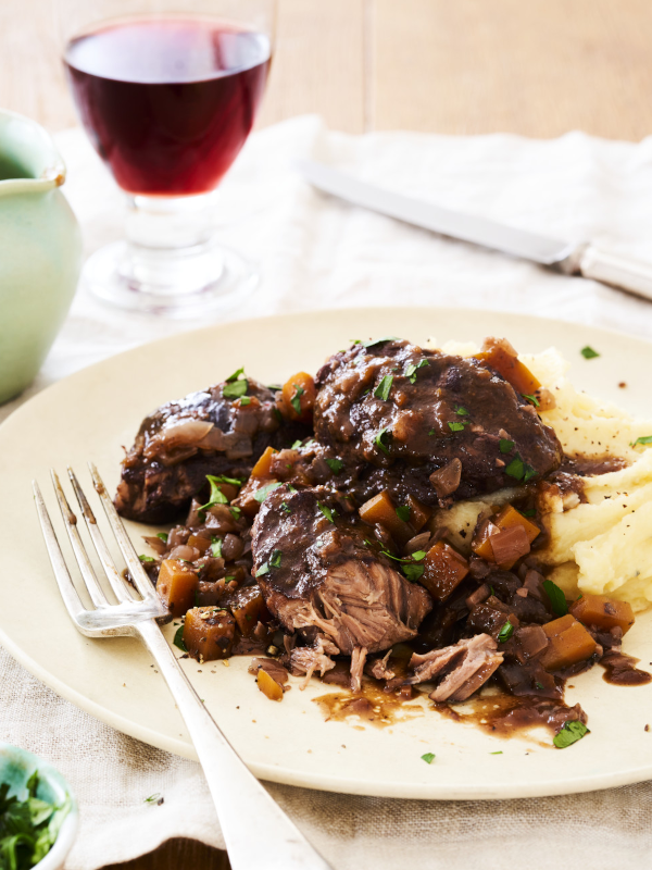 Braised pig's cheeks in red wine gravy
